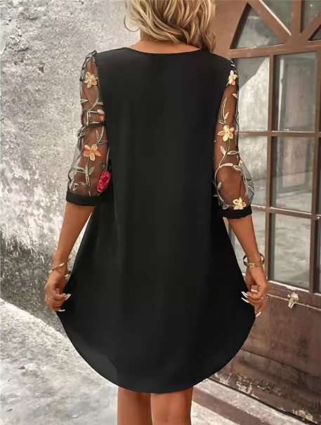 Bernice | Women's Elegant dress with a V-neckline and eye-catching sleeves